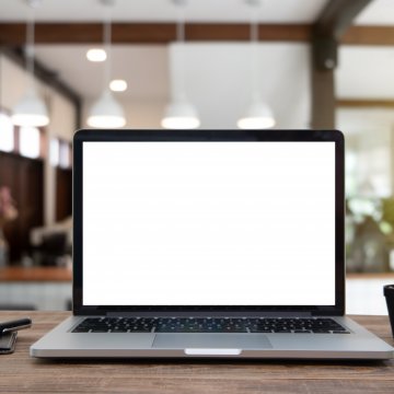 Image of blank laptop on nice bench